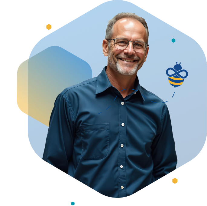 Smiling older man in blue shirt and glasses standing against a blue background with bee icon