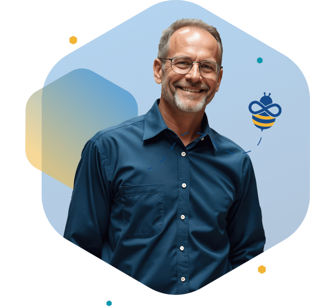 Smiling older man in blue shirt and glasses standing against a blue background with bee icon