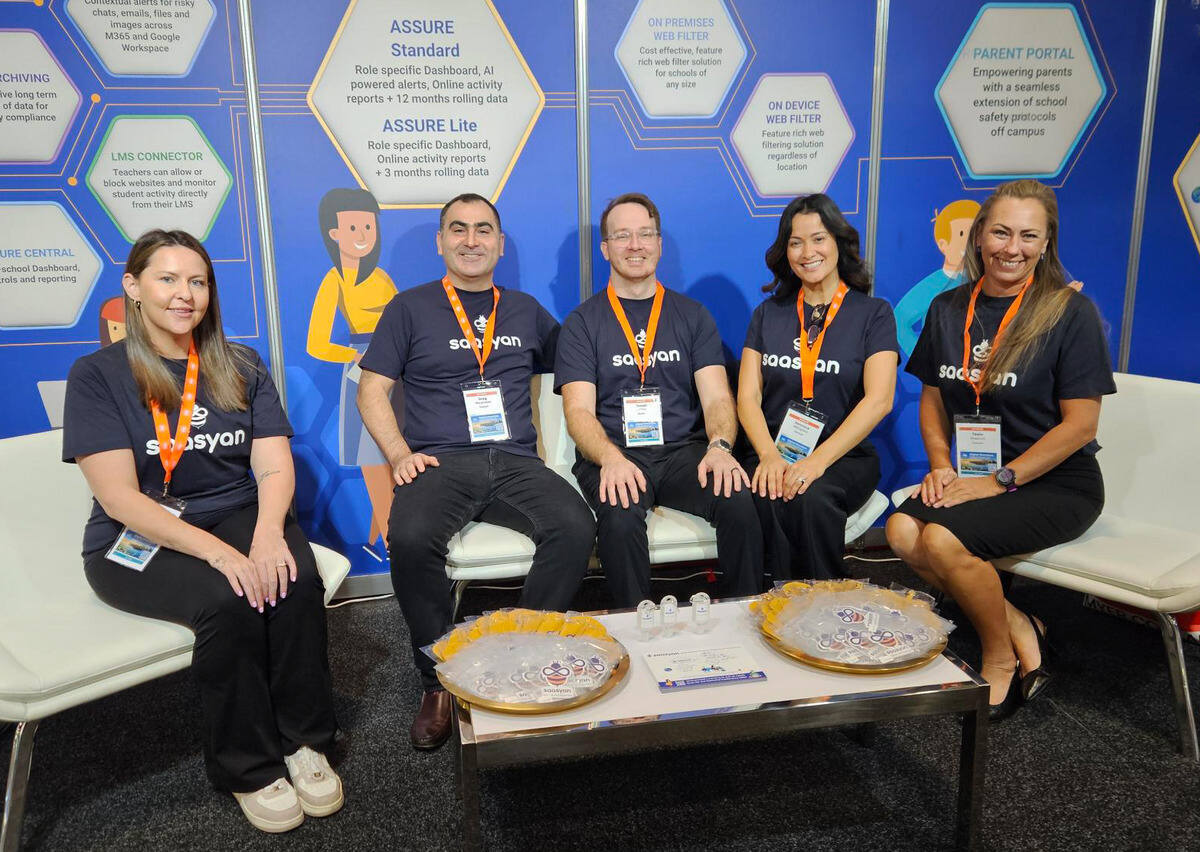 Saasyan team sitting for a team photo